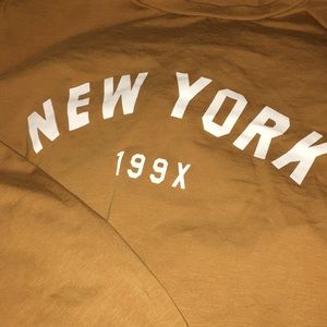 Shein- New York 199X long sleeve light brown shirt, size- small, never worn